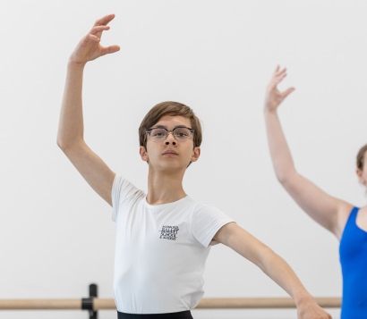 two children dancing in a ballet class
