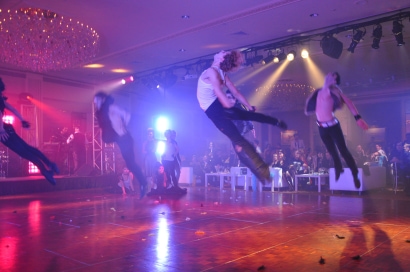 men dancers jump into the air