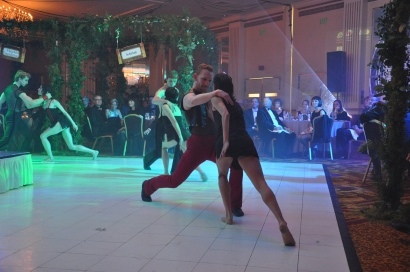 a couple performing at the ball