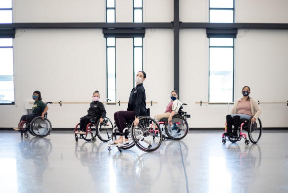 girls in wheelchairs participate in ballet class